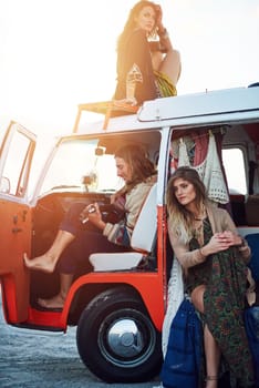 They decided it was time for a break. a group of young friends stopping at the beach during a roadtrip