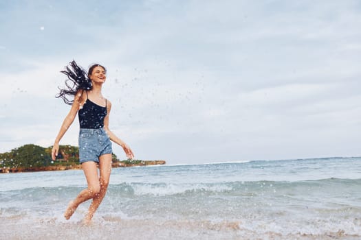 bikini woman sunset running beach sea sand positive beautiful smile walking lifestyle sun female relax freedom sunrise young summer ocean travel