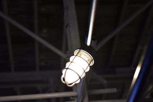 Construction Lantern Hanging from Scaffolding on Street in New York City. High quality photo