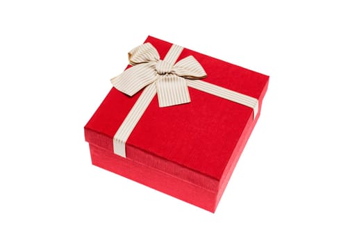 Red gift box with gold ribbon and bow isolated on white background.