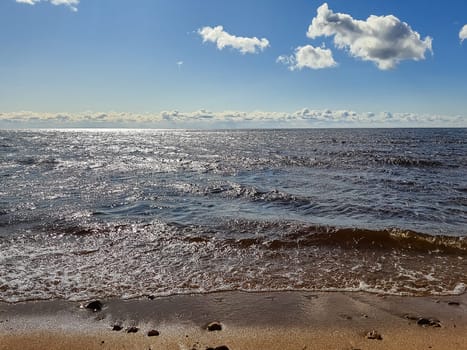 Aerial view of the Baltic Sea shore line near Klaipeda city, Lithuania. Beautiful sea coast on sunny summer day.