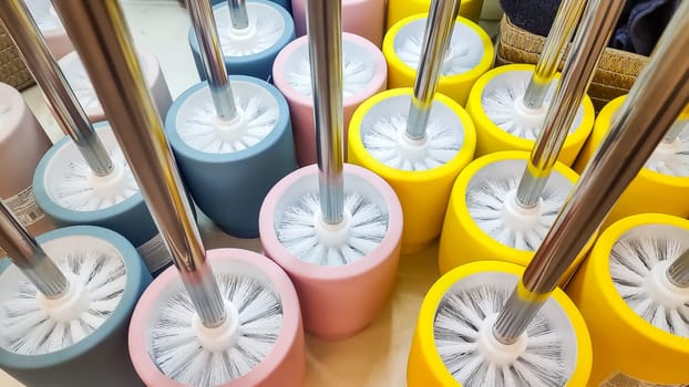 Various type of toilet brush with different size, shape and color are standing in the supermarket.cleaning the toilet
