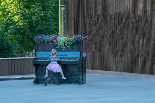 piano in the park with a place for advertising. photo