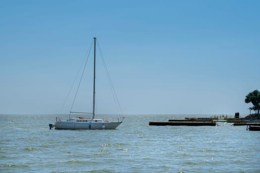 yachts on the water against the blue sky. photo