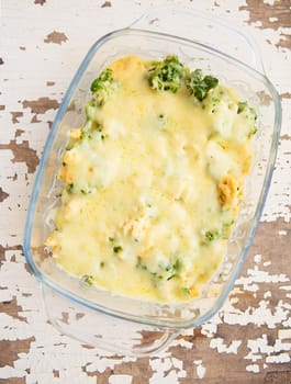 delicious broccoli casserole with cheese and cream, close-up