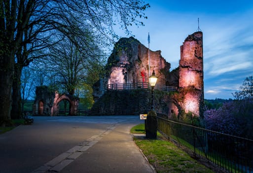 Ancient stone castle walls with keep overlooking river in Knaresborough near Harrogate in Yorkshire