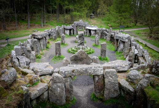 Victorian folly of Druids Plantation with standing stones created in forest in Nidderdale Yorkshire