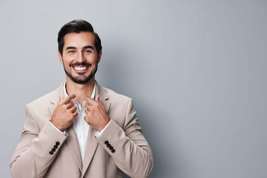 man smiling job isolated professional arm crossed handsome successful portrait beige businessman posing young suit business executive sexy copyspace happy white