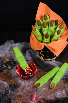 Witches Finger cookies made of short crust pastry with almond fingernail. Ideally for a Happy Halloween party