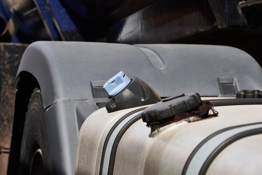 Fuel tank of a truck standing on a parking lot