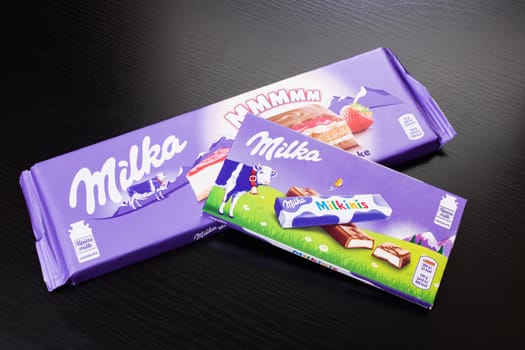 BELARUS, NOVOPOLOTSK - 20 DECEMBER, 2020: Milka chocolate close up on wooden table