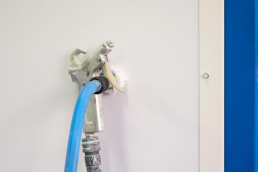 airbrush for car painting, spray gun or pistol in auto repair shop