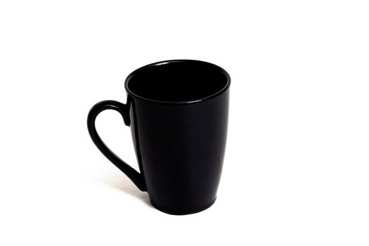 Black mug isolated on a white background close up