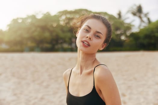 sand woman coast sea beautiful lifestyle summer copy outdoor beauty beach carefree walking ocean peaceful dress holiday sunset space smile sky vacation