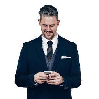Downloading apps that support his executive needs. Studio shot of a businessman using a mobile phone against a white background