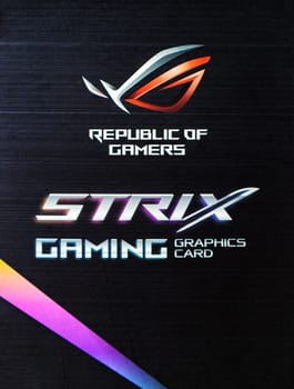 Kyiv, Ukraine - 27 January 2022: ASUS gaming logo of ROG on the box. Under the Republic of Gamers series, pro high quality video cards, motherboards, monitors, gaming keyboards and mice are produced