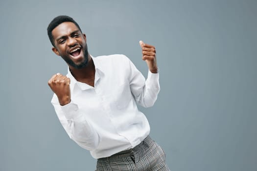 white man copy masculine business expression shirt african isolated studio guy afro portrait smile fists human american arm young standing african happy space