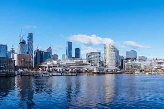 MELBOURNE, AUSTRALIA - JUNE 25: The famous Melbourne skyline from Docklands precinct on a cold winter's day on June 25th 2022