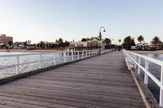 Kerford Rd Pier and Albert Park Yachting & Angling Club in Albert Park at sunset on a winter's evening in Melbourne, Victoria, Australia