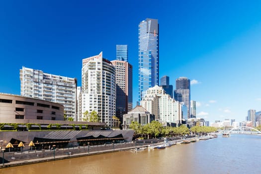 MELBOURNE, AUSTRALIA - OCTOBER 31, 2021: Views towards Melbourne CBD and Southbank along the Yarra River in Melbourne, Victoria, Australia