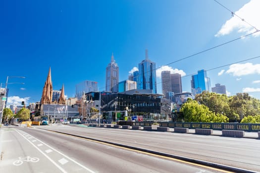 MELBOURNE, AUSTRALIA - OCTOBER 31, 2021: Views towards Melbourne CBD and Princes Bridge along the Yarra River at Birrarung Marr in Melbourne, Victoria, Australia