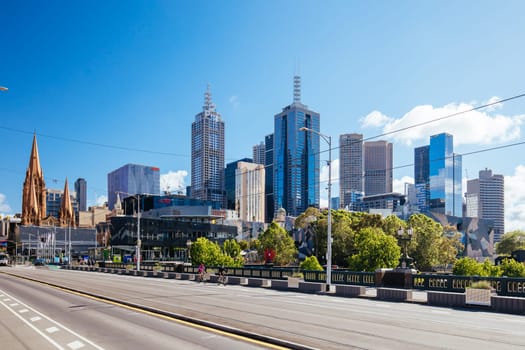 MELBOURNE, AUSTRALIA - OCTOBER 31, 2021: Views towards Melbourne CBD and Princes Bridge along the Yarra River at Birrarung Marr in Melbourne, Victoria, Australia