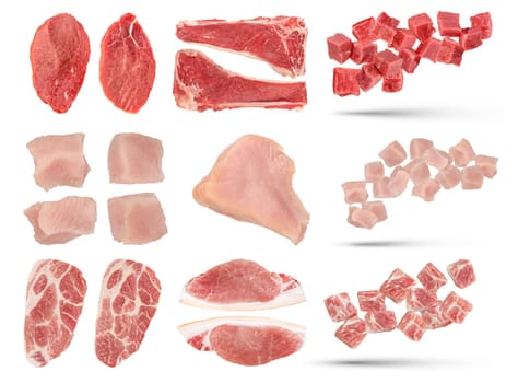 Pieces of raw meat of different varieties isolated on white background. Set of fresh meat pieces of turkey, pork and beef. A large set of meat to insert into a design or project. High quality photo