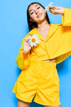 nature woman young care bouquet health romance love yellow cheerful flower model blue female joy smile chamomile freedom happiness beautiful portrait