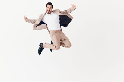 man attractive occupation businessman victory beige smiling adult office jumping winner business running person background flying job suit happy eyeglass young