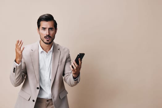 success man cellphone happy cyberspace mobile smile call phone trading hold online suit mobile guy portrait confident male business phone selfies smartphone