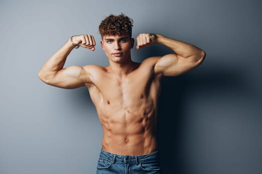 man healthy health young male curly handsome torso abs fashion fitness background strong muscle bodybuilder attractive model fit