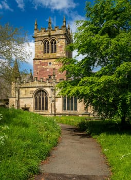 Church tower of parish church of St Mary in Ellesmere Shropshire from churchyard