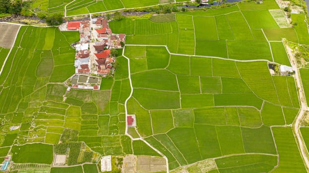 Aerial view of farmland with planting vegetables. Agricultural landscape in Sumatra, Indonesia.
