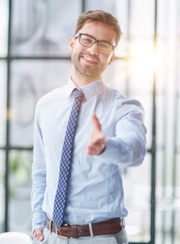 Businessman With Open Hand Ready For Handshake