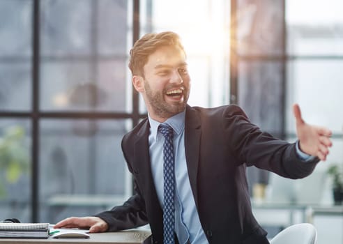 Hello. Portrait Of Cheerful Middle Aged Business Man Waving Hand Smiling