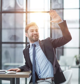 Hello. Portrait Of Cheerful Middle Aged Business Man Waving Hand Smiling