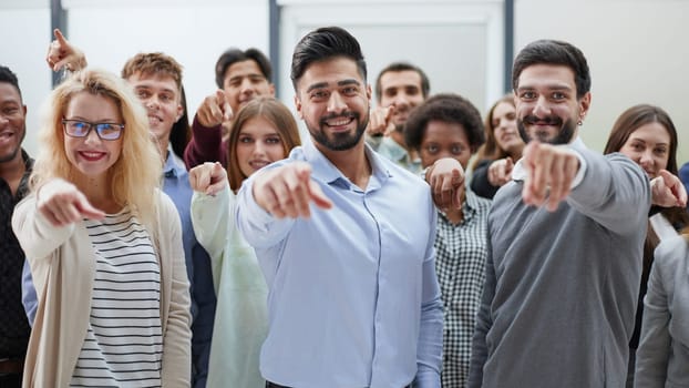 Join a successful team. Young people point to you. business concept