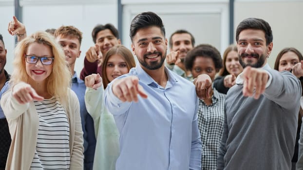 Join a successful team. Young people point to you. business concept