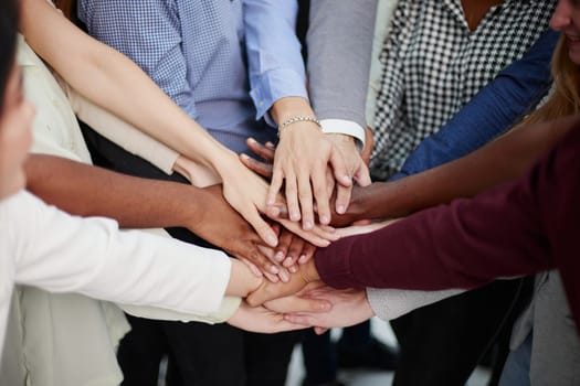Teamwork, unity concept, group of friends put their hands together with copy space