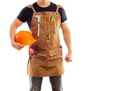 Contractor worker or carpenter in workers apron with tools and helmet isolated on white background.