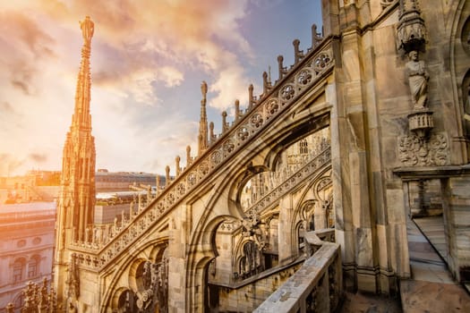 terraces of the famous Duomo Cathedral of Milan against sky