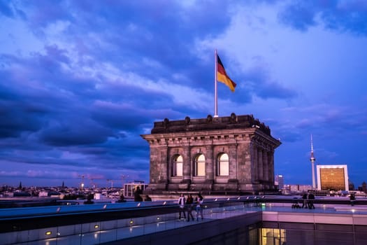 German flag on top of Reichstag building