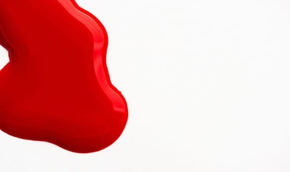 Shiny red paint stain isolated