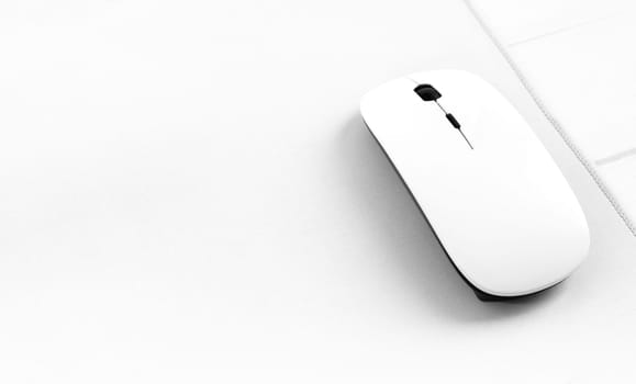 White laptop mouse with black scroll wheel