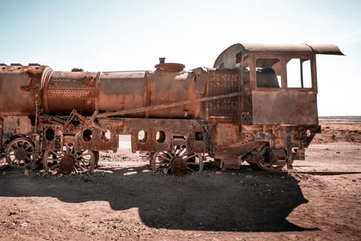 Old rusty steam train near Uyuni in Bolivia. Cemetery trains.