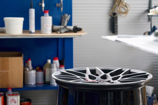 Wheel disc in auto repair shop ready to be renewed and fixed