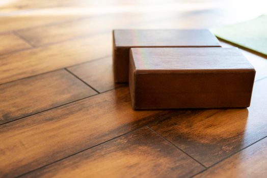 Closeup of wooden blocks yoga equipment in studio