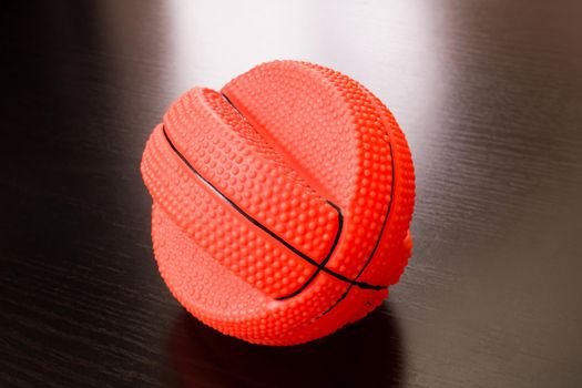 One ball for playing dogs on a wooden background