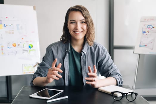Professional and Engaging: Beautiful Business Woman Conducting a Video Conference, Communicating and Connecting with Confidence Through Web Camera, Whether in the Office or from the Comfort of Home