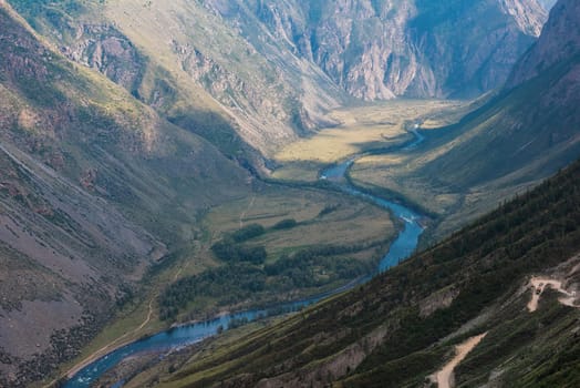 Panorama of the Katu Yaryk mountain pass and the valley of the river of Chulyshman. Altai Republic, Russia, beautiful summer day